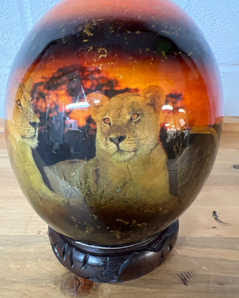 DECOUPAGE AFRICAN OSTRICH EGG WITH CARVED RING STAND, LION FAMILY ORANGE,BROWN