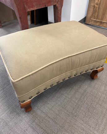 ARHAUS UPHOLSTERED OTTOMAN W/GREEN FABRIC AND NAIL HEAD DETAIL