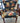 VINTAGE ARM CHAIR W/NAIL HEAD TRIM, NAVY  FLORAL UPHOLSTERY