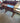VINTAGE DARK PINE DESK, 3 FRONT DRAWERS, 5 SMALL DRAWERS, WHITE KNOBS