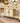 FRENCH WHITE BUFFET ON ROLLERS, DROP LEAVES, 2 DOORS, BOTTOM SHELF