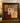 BROWN/BRONZE FRAME WITH FLORAL DESIGN BURGUNDY "IRIS" BACKGROUND WARM TONES