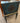 PAINTED TEAL W/GOLD MEDALLION ON TOP FILE CABINET