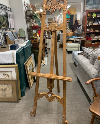 BROWN WOOD EASEL HEAVY ORNATE CARVED TOP W/FLORAL DESIGN