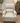 CREAM LEATHER RECLINER WITH NAIL HEAD TRIM