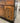 LAMBERT HITCHCOCK BLACK WOOD CABINET, 3 STENCIL DOORS NTL WOOD TOP, 2 DRAWERS, 3