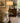 UTTERMOST  FLOOR LAMP BLACK WITH ANTIQUE BRASS, DRUM SHADE, ROUND GLASS SHELF