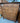 WOOD HONEY COLORED CHEST OF DRAWERS W/8 DRAWERS & SILVER KNOBS