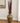 LARGE BROWN FLOOR VASE WITH RED REEDS