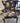 VINTAGE ARM CHAIR W/NAIL HEAD TRIM, NAVY  FLORAL UPHOLSTERY