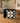 COACH WALLET, BLACK AND WHITE WITH SILVER CHAIN