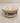 ROUND LEATHER OTTOMAN, OATMEAL COLOR, WOOD BASE