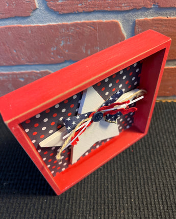 RED WOOD SHADOW BOX WITH WHITE STAR & NAVY POLKA DOT BACKGROUND