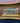 H. HAL KRAMER OIL PRINT W/GILDED GOLD RECTANGLE FRAME