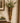 WALL MOUNTED VASE BLACK METAL MOUNT WITH BROWN CERAMIC VASE GOLD ACCENTS