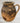 STONEWARE VESSE WITH HANDLEL, made in HUNGARY,  ORANGE, BLACK, CREAM  8" x 6"