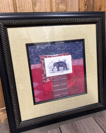 BLACK METAL FRAME WITH BEIGE WOVEN MATTE & AN ELEPHANT