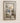 RECTANGULAR WALL MIRROR WITH BEVELED CENTER FRAMED IN SILVER WITH BEADED TRIM