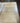 LARGE COFFEE TABLE, LIGHT WOOD TOP, WROUGHT IRON LEGS