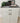 WHITE METAL KITCHEN CABINET, ONE DRAWER, TWO DOORS, BLACK TOP