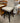 GRAY UPHOLSTERED, SWIVEL BAR STOOL, DARK WOOD LEGS