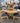 42" ROUND LIGHT WOOD TABLE W/1 LEAF & 4 CONTEMPORARY LADDER BACK CHAIRS
