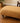 GOLD TEXTURED VELVET OTTOMAN, TURNED WOOD LEGS