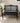 BLACK PAINTED WOODEN BENCH, ARCHED LATTICE BACK, CURVED ARMS