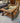 DK WOOD, RECTANGLE GLASS TOP, BOTTOM SHELF, METAL DECORATIVE SIDES
