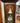 LIGHTED CHERRY CURIO CABINET, 4 SHELVES 1 GLASS DOOR