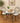 BLACK WROUGHT IRON BISTRO SET, YELLOW & BLACK UPHOLSTERY, GLASS TOP