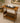 WOODEN END TABLE WITH BOOK SHELF IN CENTER, BOTTOM SHELF
