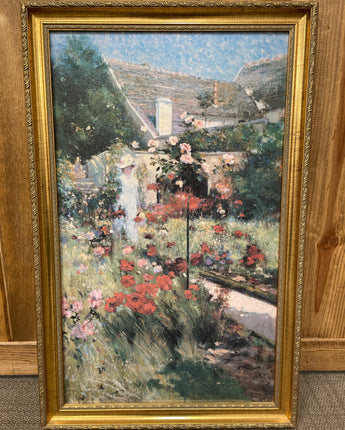 GOLD FRAME W/WHITE COTTAGE A WOMAN IN WHITE & RED FLOWERS