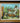 DUMONT ORIGINAL OIL PAINTING OF A VILLAGE WIDE WOOD FRAME "VINSETLIY" SIGN