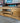 SOLID OAK ENTERTAINMENT/TV STAND W/2 CABINETS