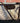 COACH KAKI/MAHOGANY ASH SIGNATURE WRISTLET