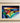 BOLD, ABSTRACT WITH RED, YELLOW, GREEN AND BLUE ART WITH METALLIC FRAME