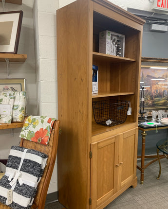 AURHAUS WOOD BOOKCASE UNIT WITH 2 DOORS 3 SHELVES STAINED BLONDE