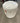 ROUND WHITE/SILVER COW HIDE OTTOMAN