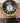 DUBOIS ROMAN NUMERAL METAL QUARTZ CLOCK IN GOLD AND BLACK