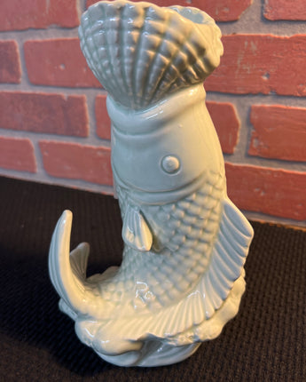 GREEN CERAMIC FISH HOLDING A SHELL IN IT'S MOUTH