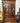 TALL DARK WOOD HUTCH w/ 2 LEADED GLASS DOORS, 1 DRAWER on BOTTOM