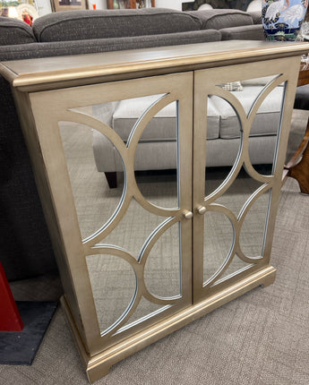 GOLD MIRRORED CABINET W/2 DOORS