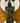 STAINED GLASS AMBER GLASS W/GREEN & WHITE ACCENT WINDOW DECOR