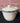 HOME & GARDEN BEIGE CROCK WITH SPONGE RIM AND RED APPLES